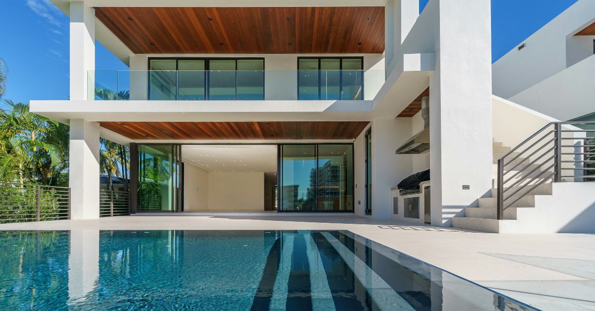 Modern 2 BHK villa for rent in Chennai featuring a private swimming pool, spacious balcony, and contemporary architecture.