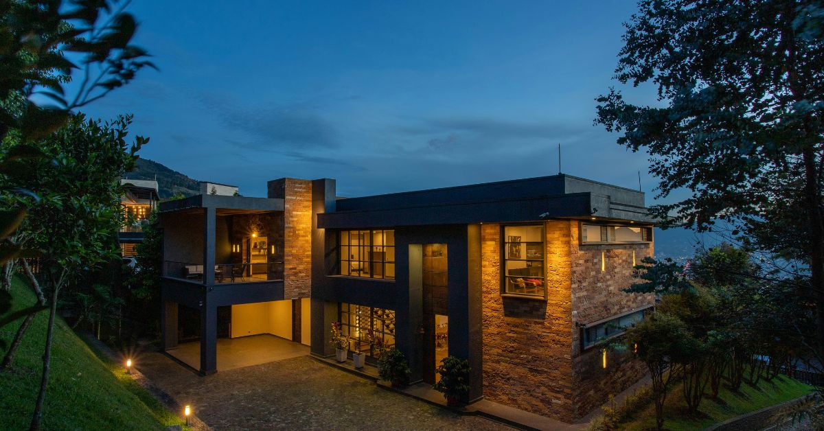 Luxury 3 BHK villa for rent in Chennai with landscaped garden, warm lighting, and independent house layout.