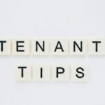 White letter tiles spelling “Tenant Tips” on a clean white background