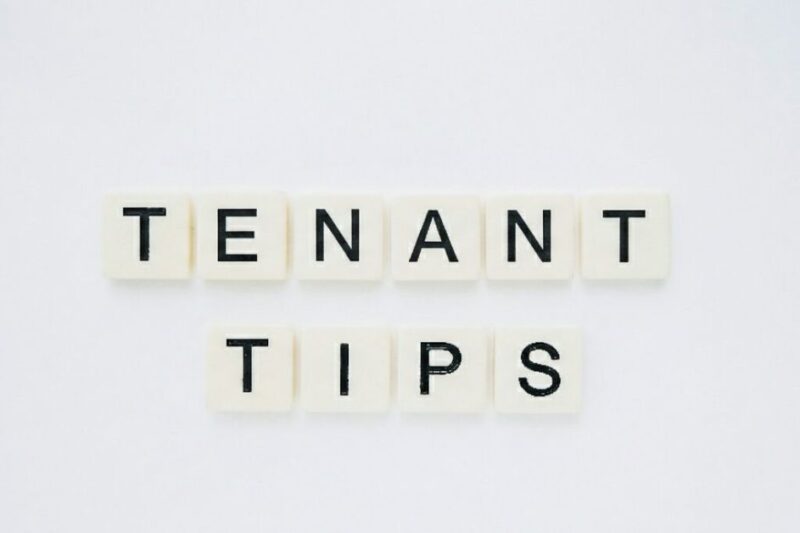 White letter tiles spelling “Tenant Tips” on a clean white background