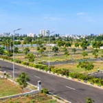EMI Plots in Chennai with a modern residential layout, paved roads, streetlights, greenery and marked plots